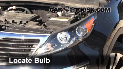 kia sportage headlight bulb replacement